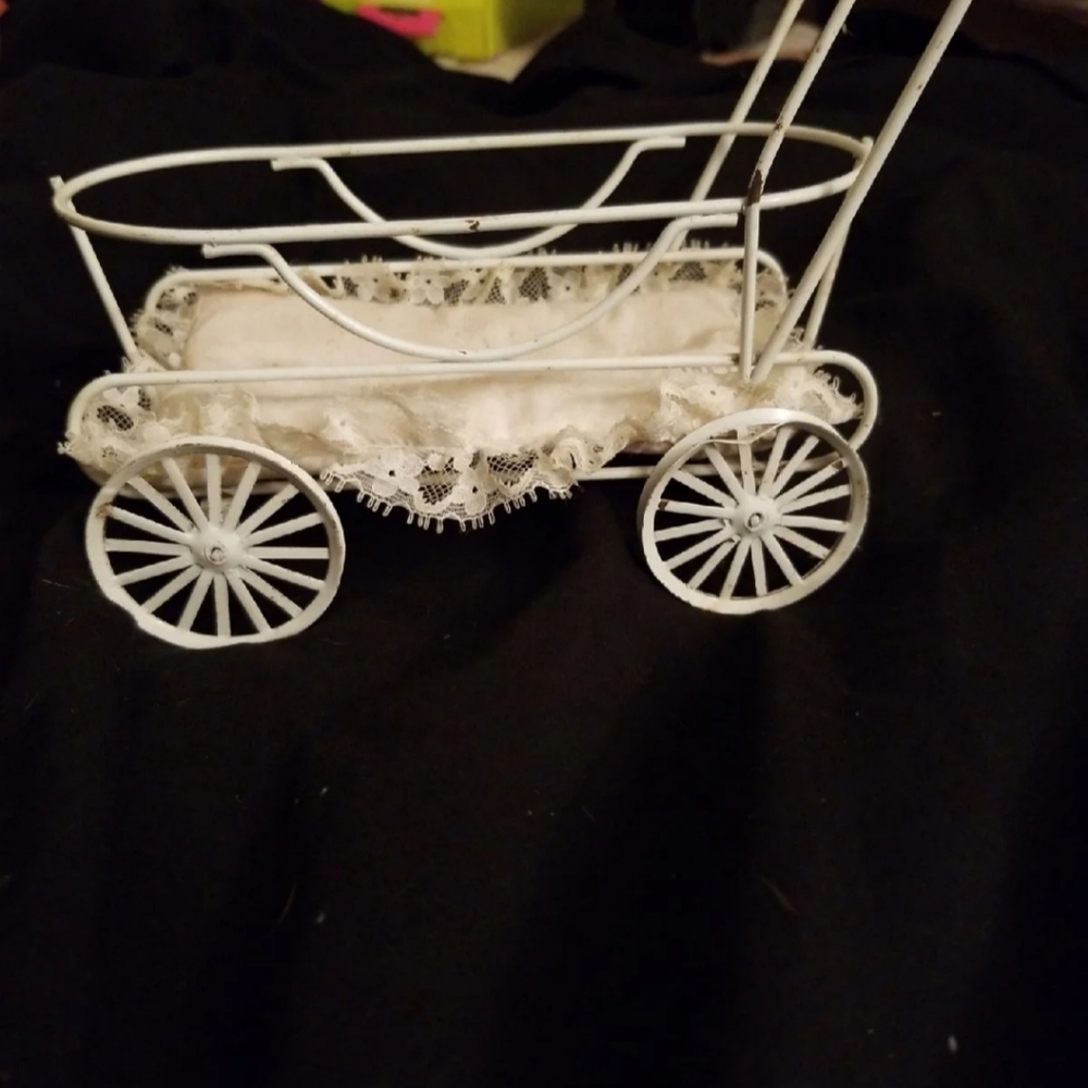 Antique mini baby carriage